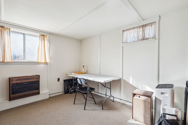 carpeted office featuring heating unit