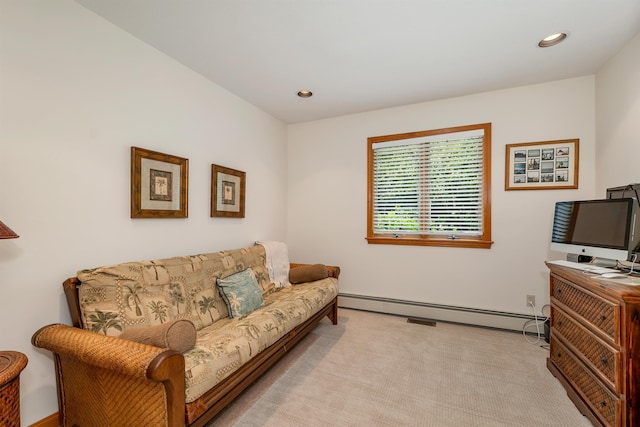 interior space featuring light colored carpet and baseboard heating