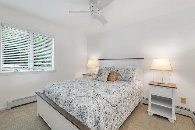 bedroom featuring ceiling fan, a baseboard radiator, and light carpet