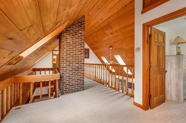 bonus room featuring carpet floors, wooden ceiling, ceiling fan, and vaulted ceiling