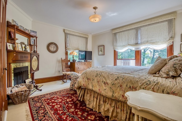 bedroom with cooling unit and ornamental molding