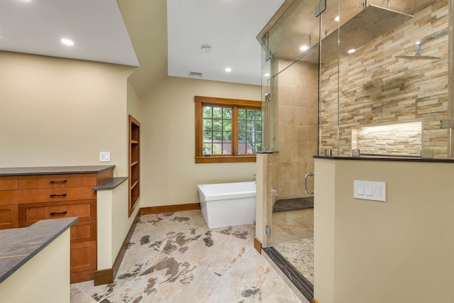 bathroom featuring plus walk in shower