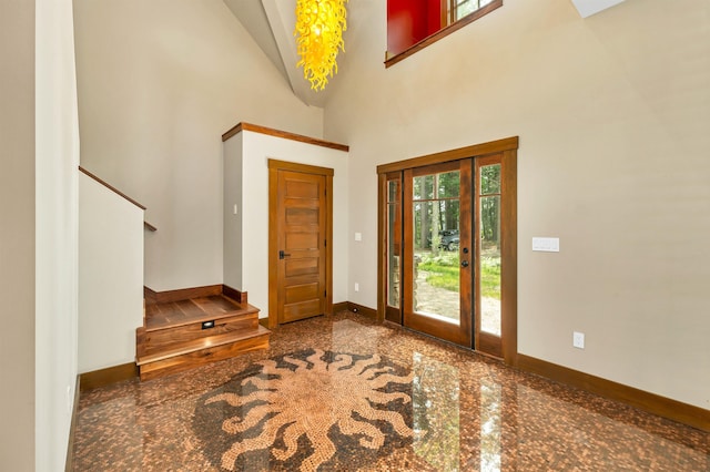 entrance foyer with a towering ceiling