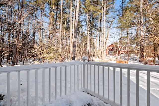 view of snow covered deck