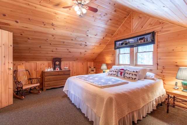 bedroom with carpet flooring, wooden walls, vaulted ceiling, and wooden ceiling