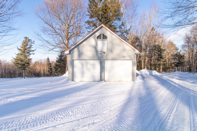 view of snow covered garage