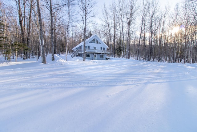 view of yard covered in snow