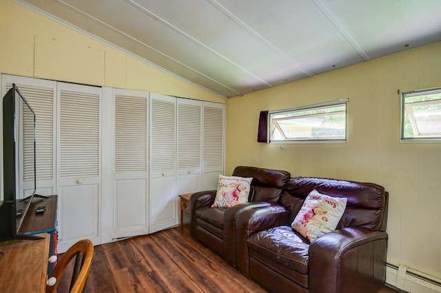 living room with lofted ceiling, a baseboard heating unit, and dark hardwood / wood-style floors