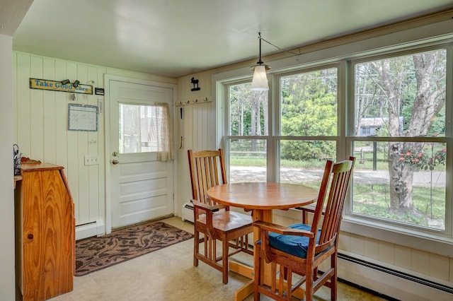 dining space with a baseboard radiator