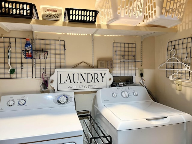 laundry room with washing machine and dryer