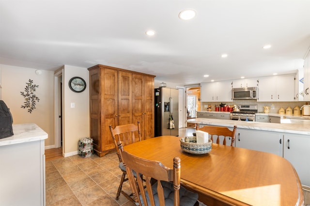 dining space with sink