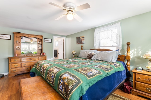 bedroom with ceiling fan and hardwood / wood-style floors