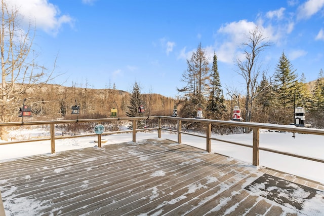 dock area with a deck with mountain view