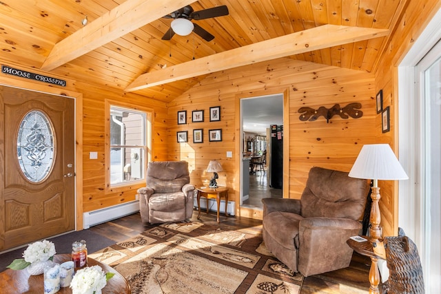 sitting room with hardwood / wood-style floors, wooden walls, vaulted ceiling with beams, a baseboard heating unit, and wood ceiling