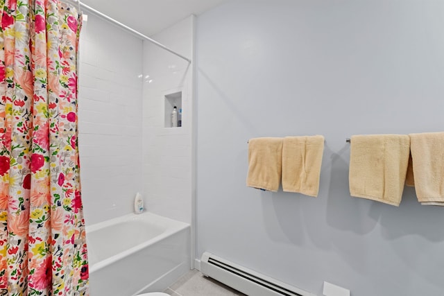 bathroom featuring shower / tub combo with curtain and a baseboard heating unit