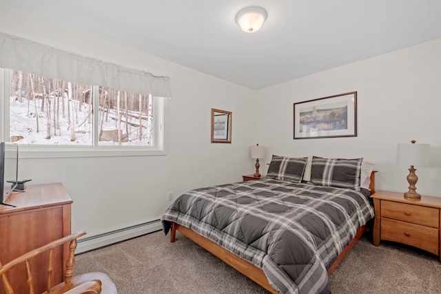 bedroom featuring a baseboard radiator and carpet flooring