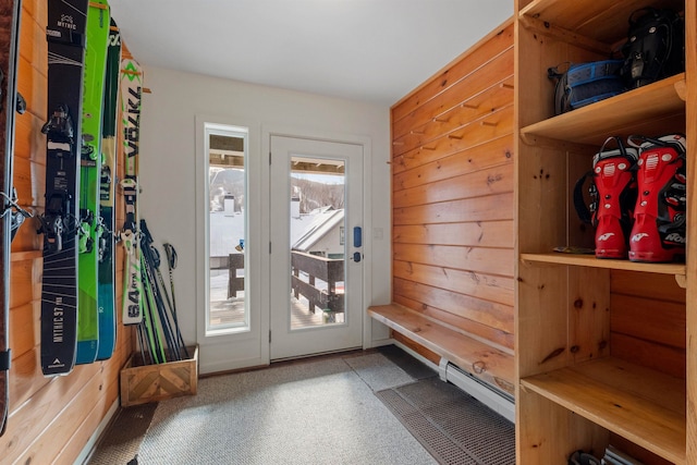 mudroom with wooden walls