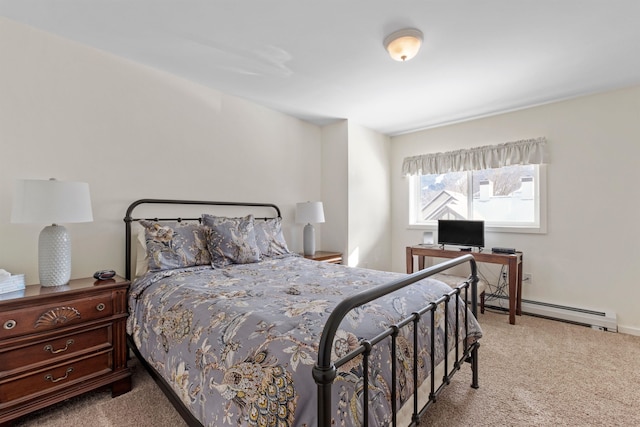 carpeted bedroom featuring a baseboard heating unit