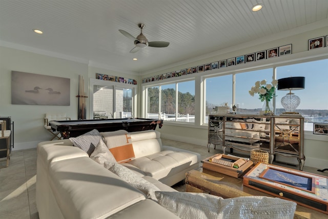 sunroom / solarium with pool table and ceiling fan