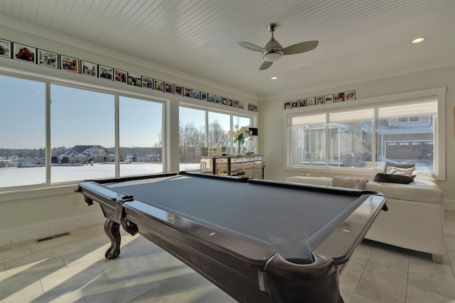 playroom with a wealth of natural light, ceiling fan, and light tile patterned floors