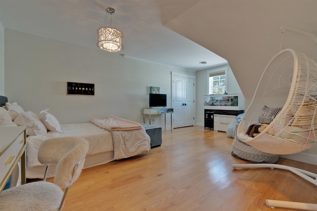 bedroom featuring light hardwood / wood-style flooring