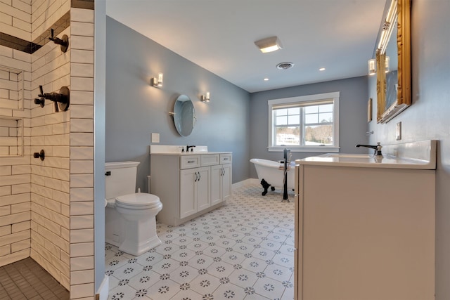 full bathroom featuring vanity, toilet, and independent shower and bath