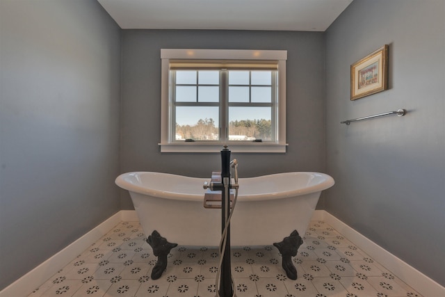 bathroom with a tub to relax in