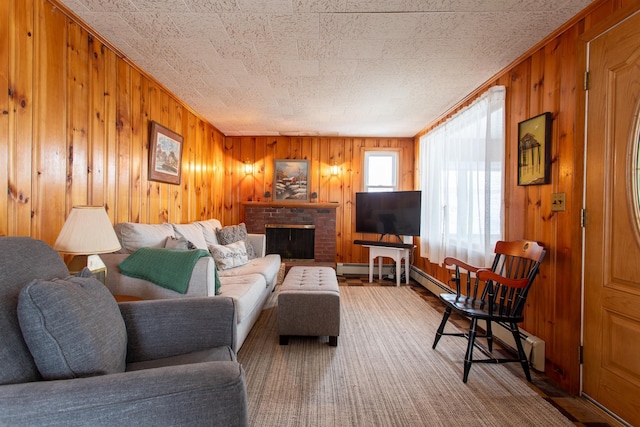 living room with wooden walls, carpet flooring, and a fireplace