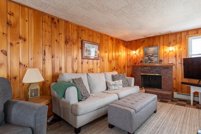 living room with a fireplace, wooden walls, and baseboard heating