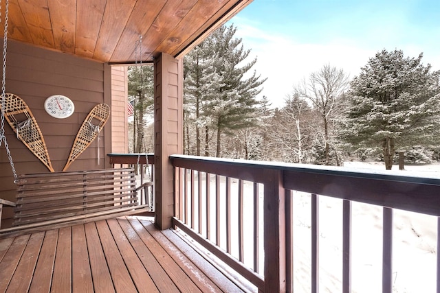 view of snow covered deck