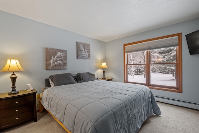 bedroom featuring light colored carpet and baseboard heating