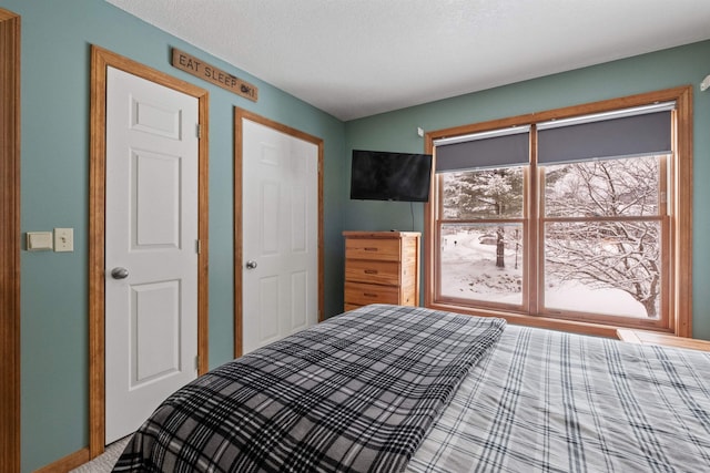 bedroom featuring a textured ceiling