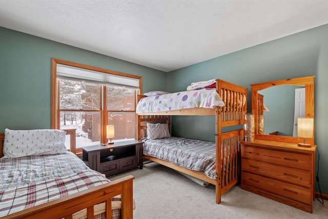 bedroom with light carpet