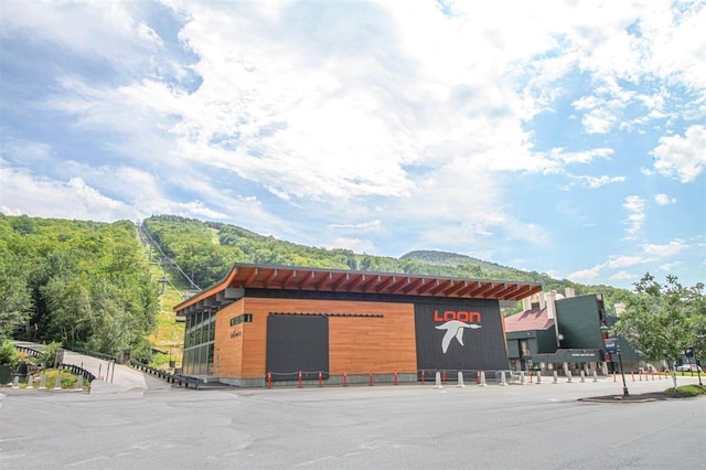 view of building exterior with a mountain view