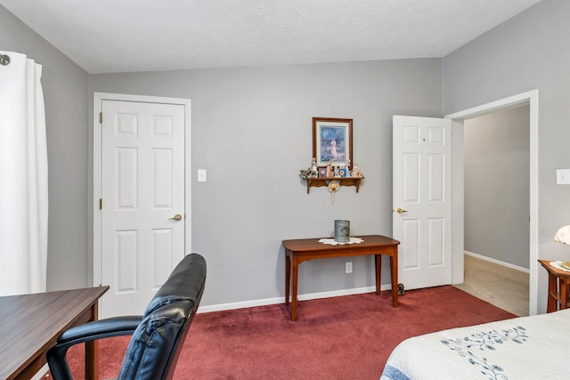 carpeted bedroom featuring vaulted ceiling and a textured ceiling