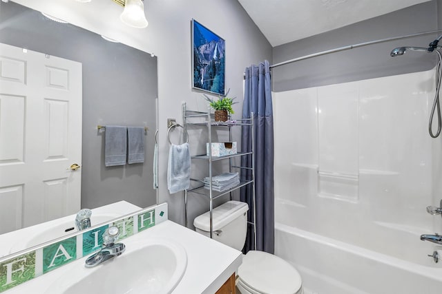 full bathroom featuring shower / tub combo, vanity, and toilet