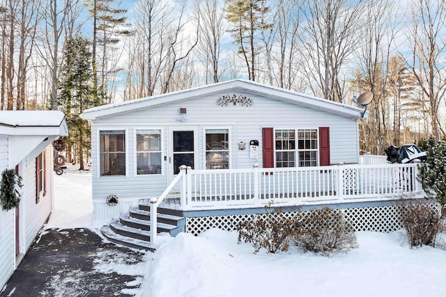 view of front of home with a wooden deck