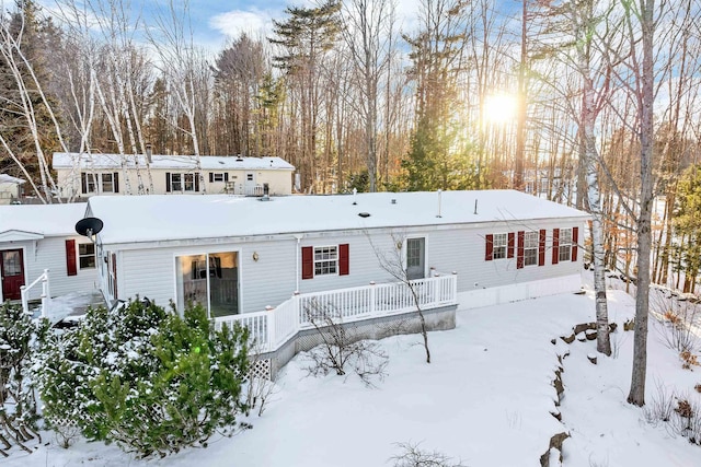 view of snow covered house