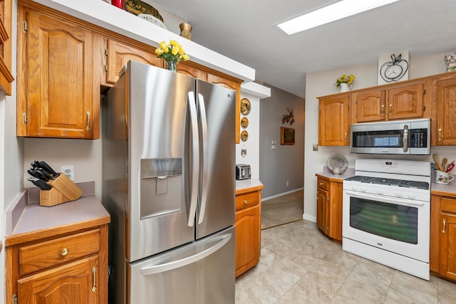 kitchen with appliances with stainless steel finishes