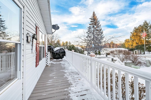 view of snow covered deck