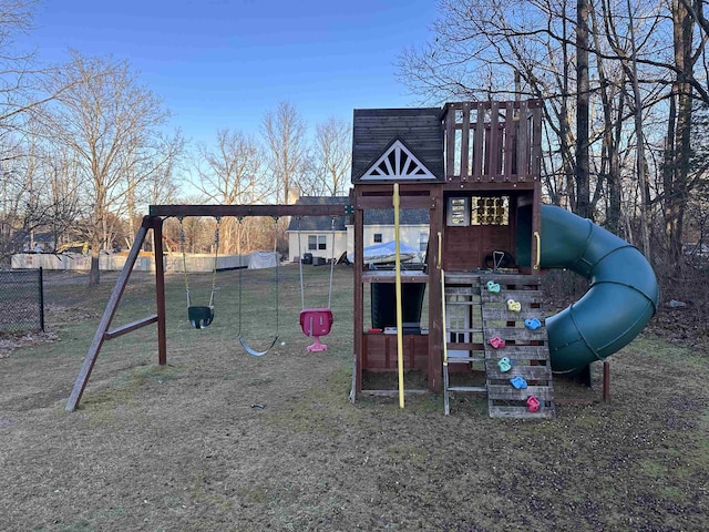 view of jungle gym featuring a lawn