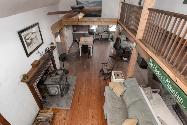 living room with hardwood / wood-style flooring and ceiling fan