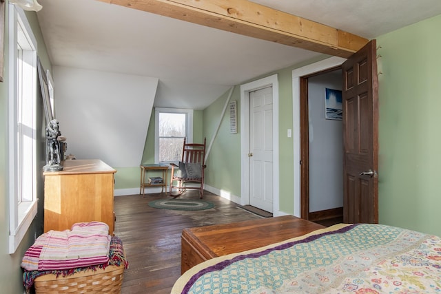 bedroom with dark wood-type flooring