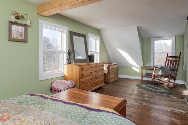 bedroom featuring dark hardwood / wood-style floors and lofted ceiling with beams