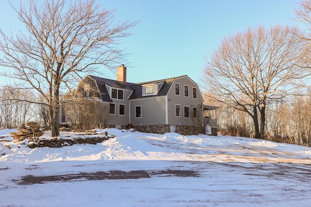 view of snow covered property