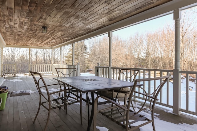 view of snow covered deck