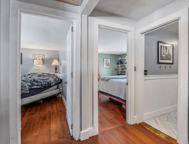 corridor featuring hardwood / wood-style flooring