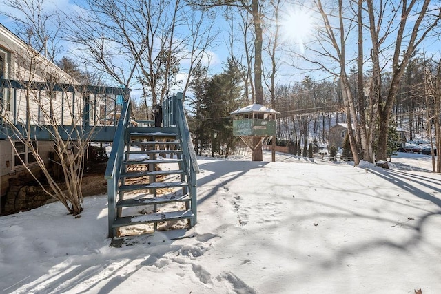 view of yard covered in snow