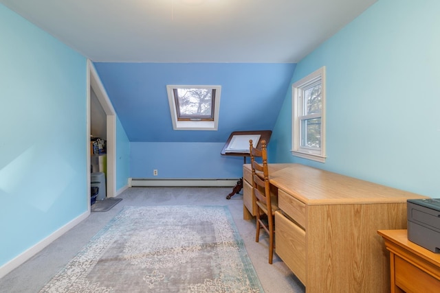 home office featuring a baseboard heating unit, light colored carpet, lofted ceiling with skylight, and a wood stove