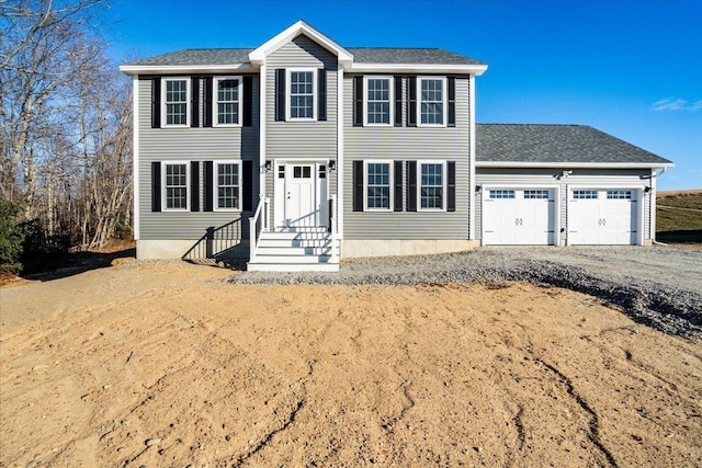 colonial house featuring a garage